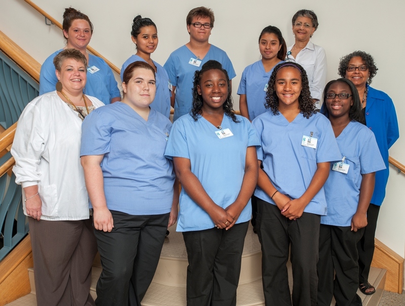 High school students have been learning about careers in healthcare at Beebe Medical Center as part of the Classic Upward Bound program. Pictured here, left to right: Back row: students Haley Achuff, Maria Felipe-Mesa, Christian Brightwell, and Keiry Lopez; and Ava Wright, Director of Laboratory Services at Beebe Medical Center Ava; Cheryl Miller Classic Upward Board Program Manager at Delaware Technical Community College, Georgetown. Front row: Jennifer Hargreaves, BA, RN, Clinical Education Specialist at Beebe Medical Center; and students Amber Watson, Miesha Feddiman, Serina Brooks, and Madison Bull. ---